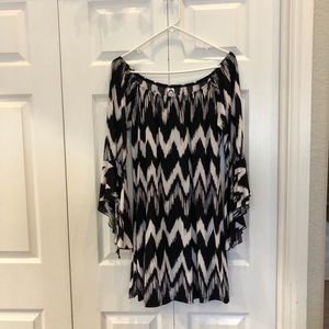 Black/white chevron tunic with bell sleeves.